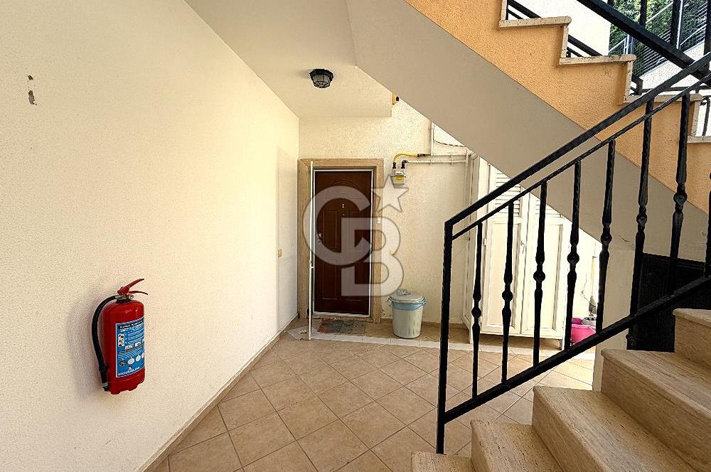 Bodrum Merkez'de Satılık Geniş Site İçi 2+1 Bahçe Katı Daire