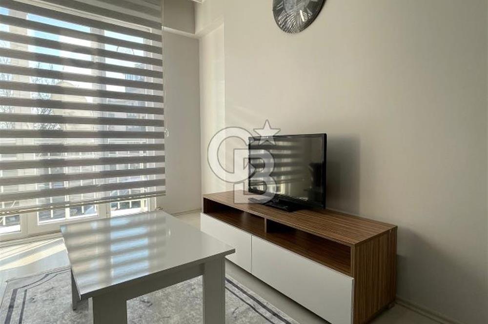GÖRÜKLE DE MERKEZİ KONUMDA 1+1 EŞYALI SATILIK KİRACISIZ DAİRE