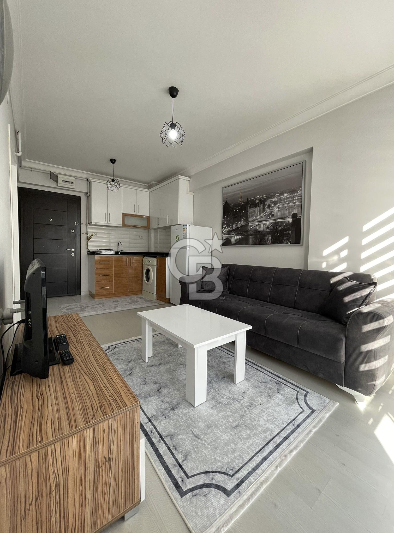 GÖRÜKLE DE MERKEZİ KONUMDA 1+1 EŞYALI SATILIK KİRACISIZ DAİRE