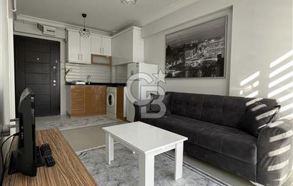 GÖRÜKLE DE MERKEZİ KONUMDA 1+1 EŞYALI SATILIK KİRACISIZ DAİRE