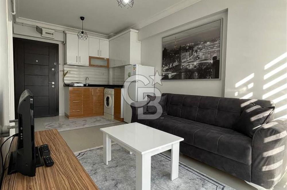GÖRÜKLE DE MERKEZİ KONUMDA 1+1 EŞYALI SATILIK KİRACISIZ DAİRE