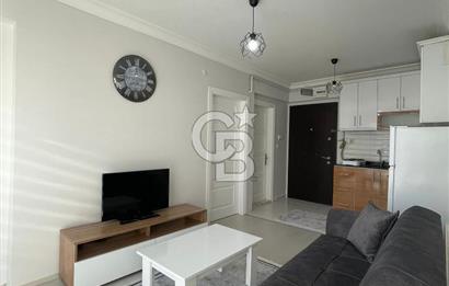 GÖRÜKLE DE MERKEZİ KONUMDA 1+1 EŞYALI SATILIK KİRACISIZ DAİRE