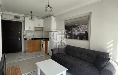 GÖRÜKLE DE MERKEZİ KONUMDA 1+1 EŞYALI SATILIK KİRACISIZ DAİRE