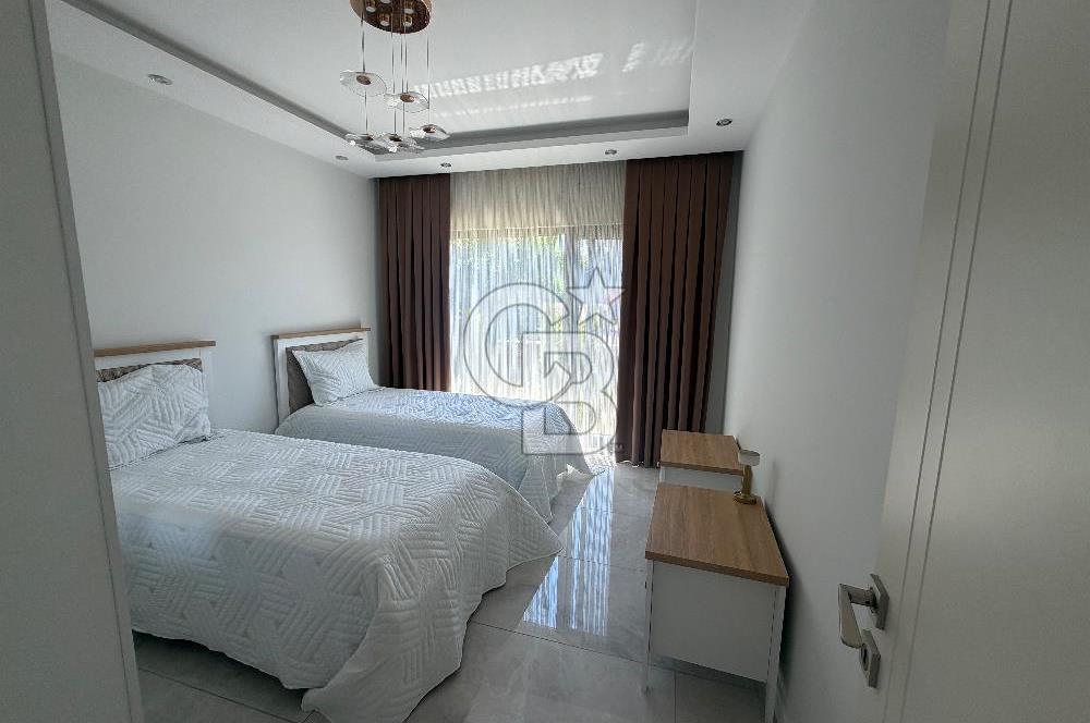 ÇANAKKALE KIZILKEÇİLİ KÖYÜNDE SATILIK BAHÇELİ KARGİR EV