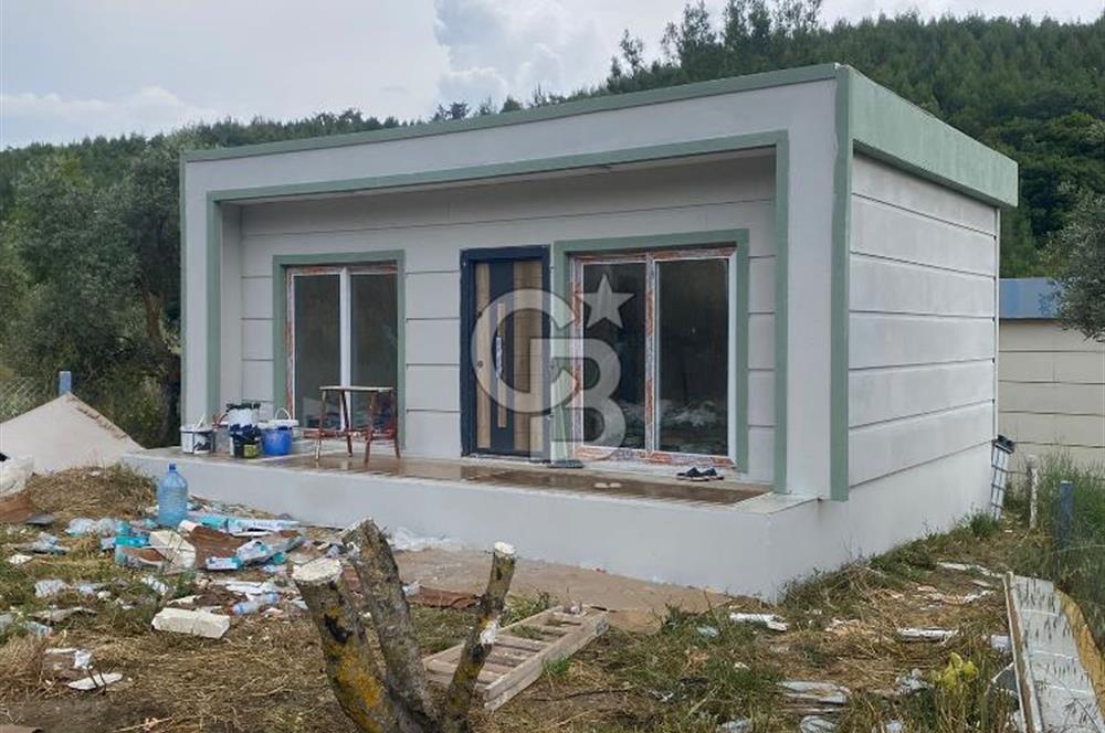 TORBALI ORMANKÖY’DE ÇELİK EV BULUNAN SATILIK TARLA HİSSESİ