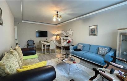 BEGONVİL EVLERİ'NDE SATILIK 95 m2 NET 2+1 BAHÇE KATI DAİRE