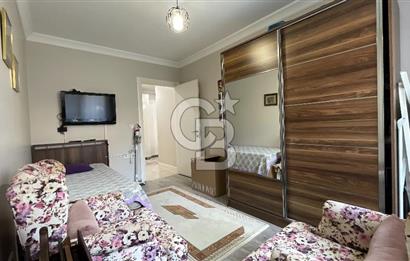 BEGONVİL EVLERİ'NDE SATILIK 95 m2 NET 2+1 BAHÇE KATI DAİRE