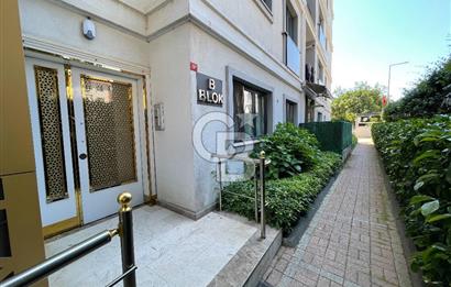 BEGONVİL EVLERİ'NDE SATILIK 95 m2 NET 2+1 BAHÇE KATI DAİRE