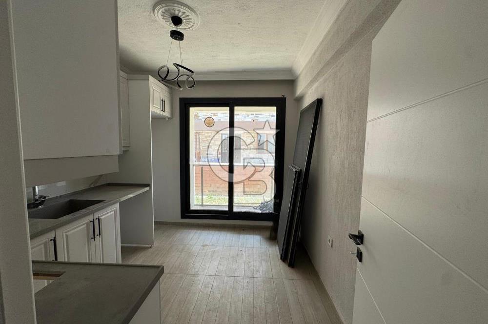 Foça Yenibağarası Mah. Kiralık 2+1 Bahçe Katı Daire