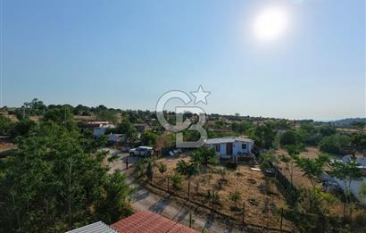 EZİNE KARADAĞ KÖYÜNDE YAPI KAYIT BELGELİ 375 M2 ARSA İÇERİSİNDE SATILIK KÖYEVİ FIRSAT PORTFÖY