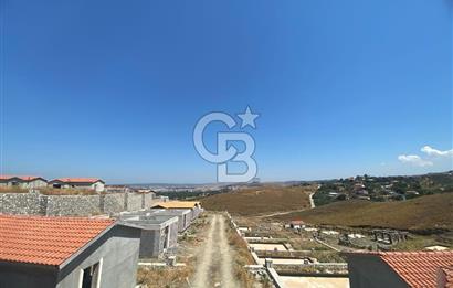 SEFERİHİSAR TEPECİK'TE TEMELİ ATILMIŞ 14 AY SONRA TESLİM SATILIK KOOPERATİF HİSSELİ KONUT ARSASI 