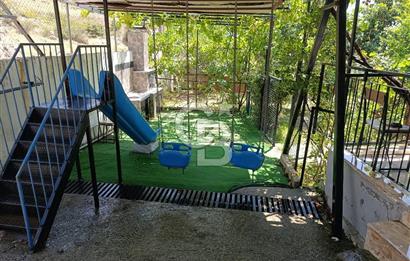 Doğançay'da Meyve Bahçeli 2+1 Evi Olan Satılık Hisseli Tarla