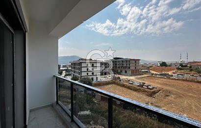 KEMALPAŞA ULUCAK’TA DEMOKRASİ ÜNİVERSİTESİ YAKININDA SATILIK LÜKS 2+1 DAİRE
