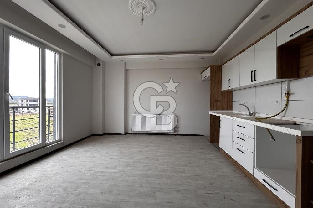 Gömeç Mithatpaşa'da Doğalgazlı Satılık 1+1 Daire