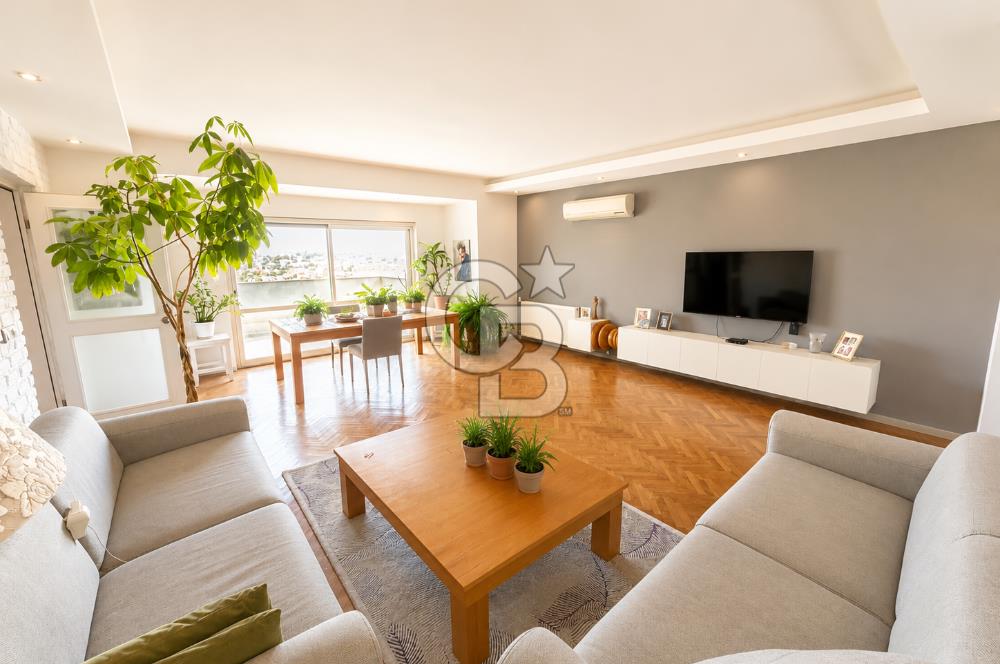 OLİMPİYAT KÖYÜNDE GENİŞ TERASLI MODERN 3+1 KISMİ EŞYALI SATILIK