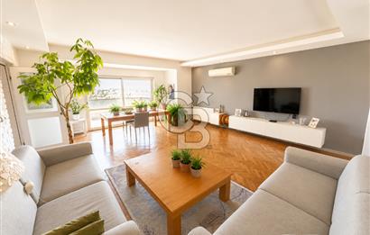 OLİMPİYAT KÖYÜNDE GENİŞ TERASLI MODERN 3+1 KISMİ EŞYALI SATILIK