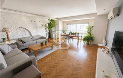 OLİMPİYAT KÖYÜNDE GENİŞ TERASLI MODERN 3+1 KISMİ EŞYALI SATILIK