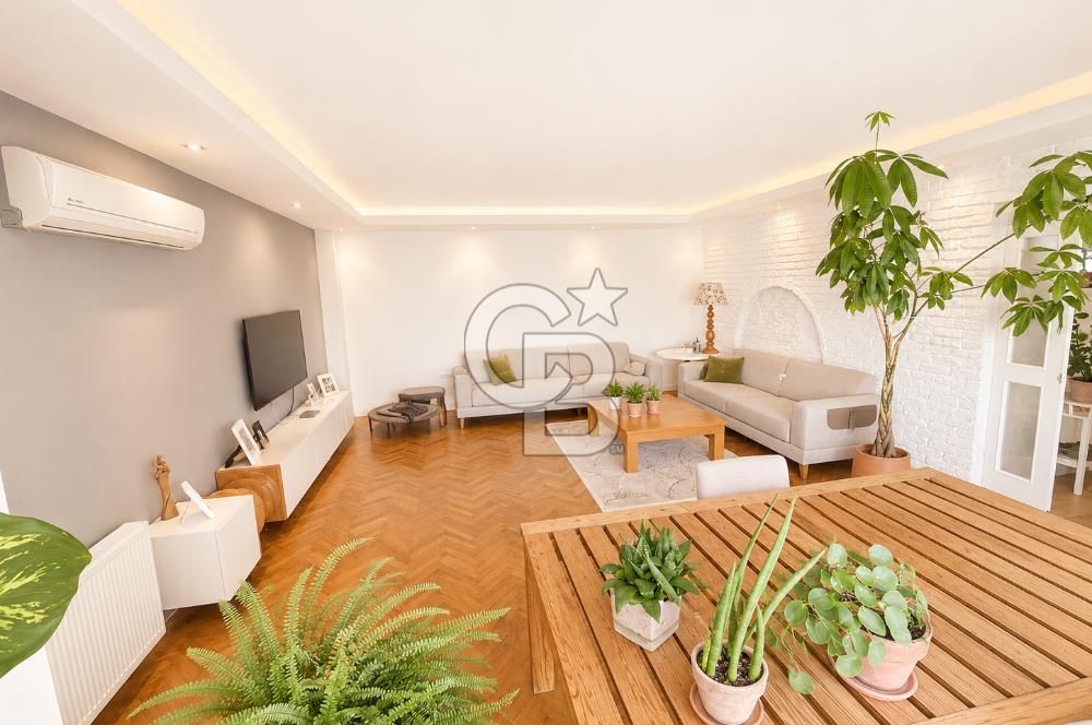 OLİMPİYAT KÖYÜNDE GENİŞ TERASLI MODERN 3+1 KISMİ EŞYALI SATILIK