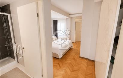 OLİMPİYAT KÖYÜNDE GENİŞ TERASLI MODERN 3+1 KISMİ EŞYALI SATILIK