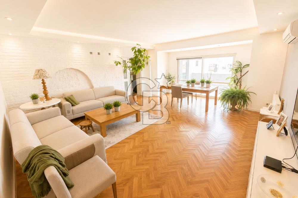 OLİMPİYAT KÖYÜNDE GENİŞ TERASLI MODERN 3+1 KISMİ EŞYALI SATILIK