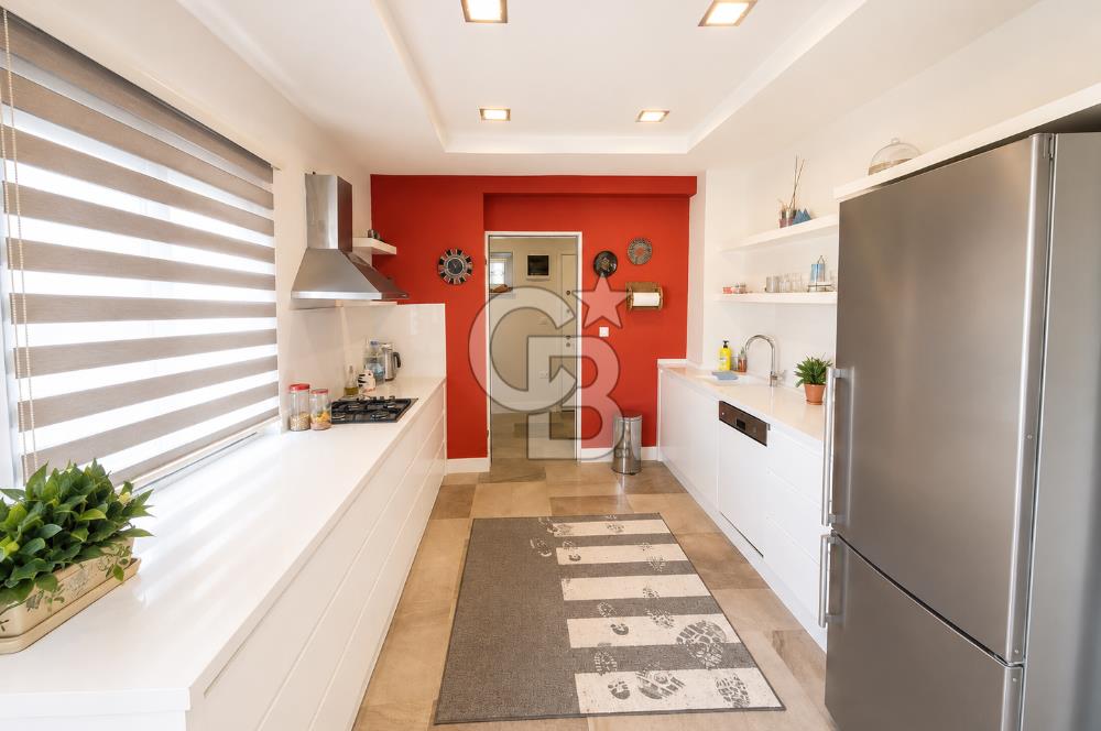 OLİMPİYAT KÖYÜNDE GENİŞ TERASLI MODERN 3+1 KISMİ EŞYALI SATILIK
