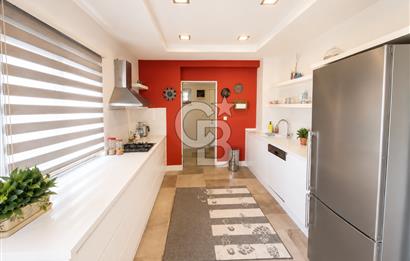 OLİMPİYAT KÖYÜNDE GENİŞ TERASLI MODERN 3+1 KISMİ EŞYALI SATILIK
