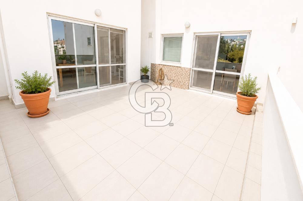 OLİMPİYAT KÖYÜNDE GENİŞ TERASLI MODERN 3+1 KISMİ EŞYALI SATILIK