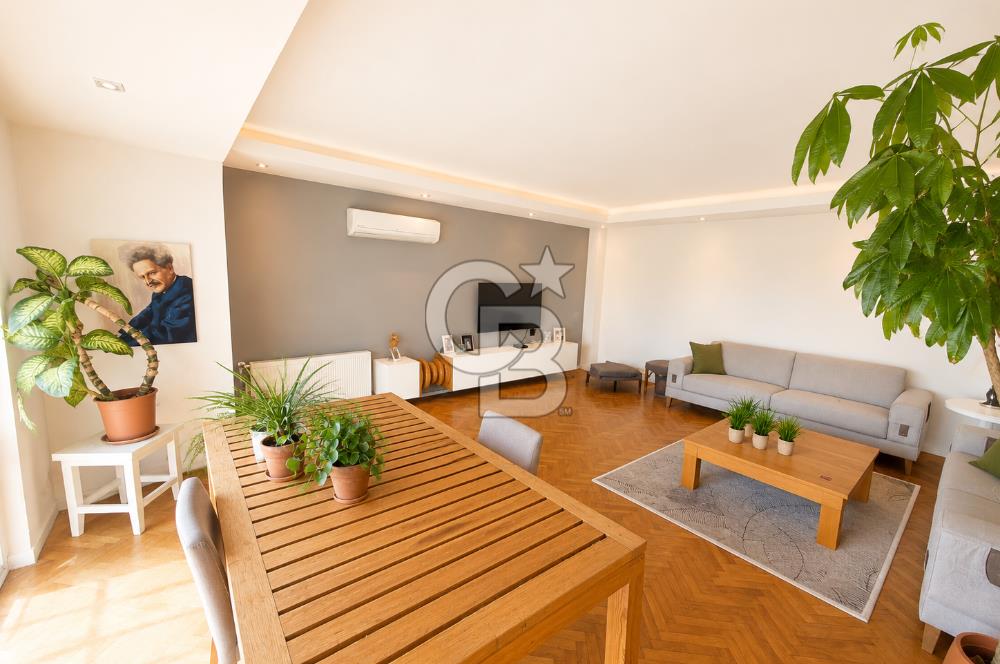 OLİMPİYAT KÖYÜNDE GENİŞ TERASLI MODERN 3+1 KISMİ EŞYALI SATILIK
