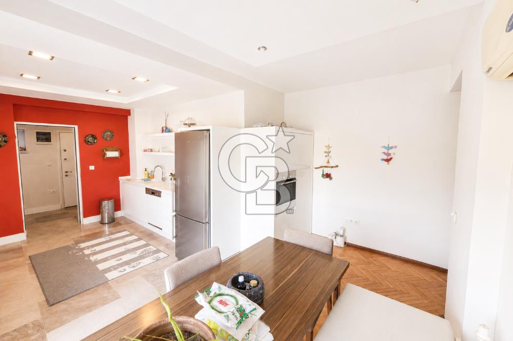 OLİMPİYAT KÖYÜNDE GENİŞ TERASLI MODERN 3+1 KISMİ EŞYALI SATILIK