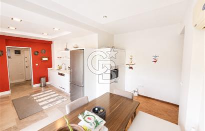 OLİMPİYAT KÖYÜNDE GENİŞ TERASLI MODERN 3+1 KISMİ EŞYALI SATILIK