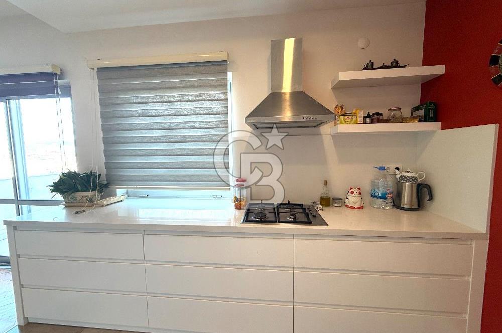 OLİMPİYAT KÖYÜNDE GENİŞ TERASLI MODERN 3+1 KISMİ EŞYALI SATILIK