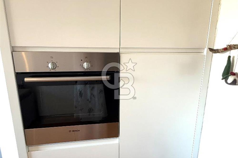 OLİMPİYAT KÖYÜNDE GENİŞ TERASLI MODERN 3+1 KISMİ EŞYALI SATILIK