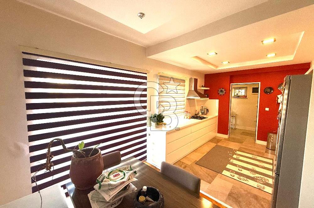 OLİMPİYAT KÖYÜNDE GENİŞ TERASLI MODERN 3+1 KISMİ EŞYALI SATILIK