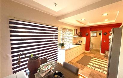 OLİMPİYAT KÖYÜNDE GENİŞ TERASLI MODERN 3+1 KISMİ EŞYALI SATILIK