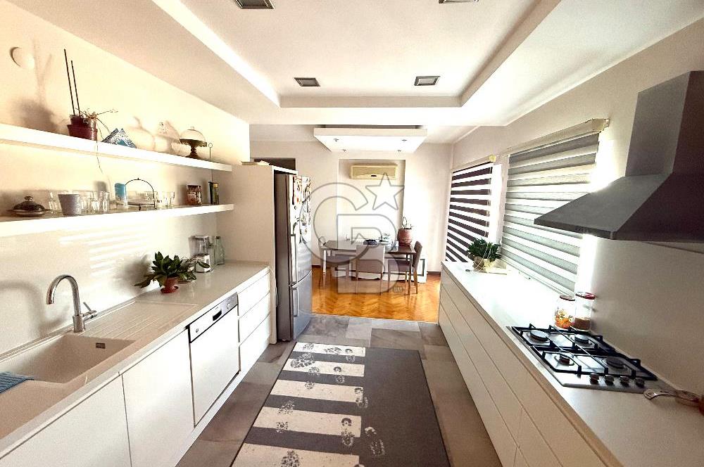 OLİMPİYAT KÖYÜNDE GENİŞ TERASLI MODERN 3+1 KISMİ EŞYALI SATILIK