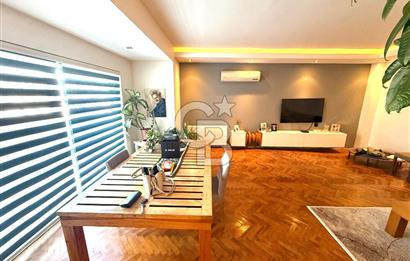 OLİMPİYAT KÖYÜNDE GENİŞ TERASLI MODERN 3+1 KISMİ EŞYALI SATILIK