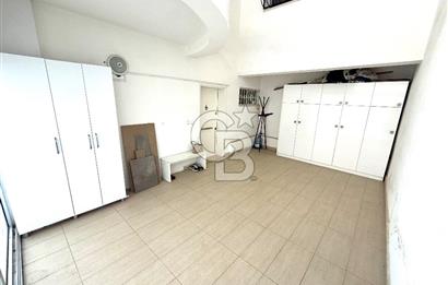 OLİMPİYAT KÖYÜNDE GENİŞ TERASLI MODERN 3+1 KISMİ EŞYALI SATILIK