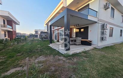 AYVALIK ALTINOVA'DA HAVUZLU SİTEDE 2+1 BAHÇE KATI DAİRE