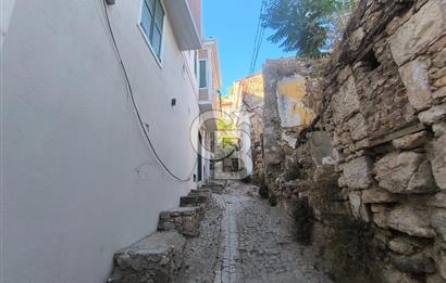 AYVALIK'IN TARİHİ DOKUSUNDA, HAYALLERİNİZDEKİ TAŞ EVİ YARATMA FIRSATI!