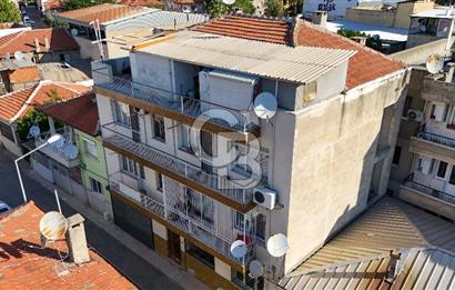 ÇİĞLİ MERKEZİ KONUMDA SATILIK ZEMİN KAT 2+1 DAİRE