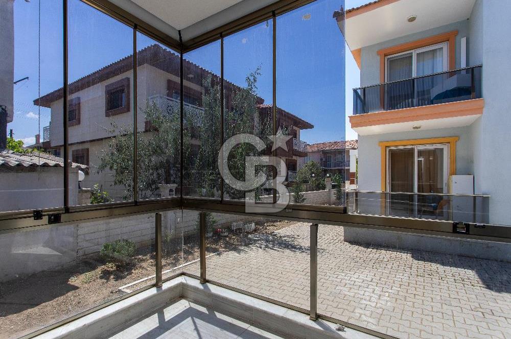 Foça Bağarası Hacıveli Mah. Satılık 2+1 Bahçe Katı Daire