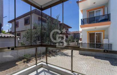 Foça Bağarası Hacıveli Mah. Satılık 2+1 Bahçe Katı Daire