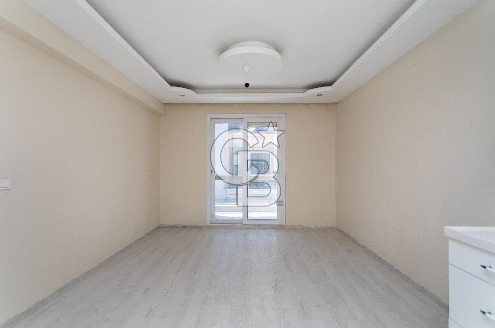 Foça Bağarası Hacıveli Mah. Satılık 2+1 Bahçe Katı Daire