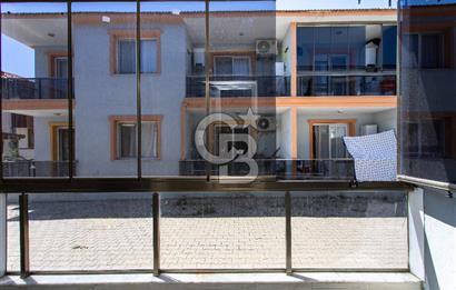 Foça Bağarası Hacıveli Mah. Satılık 2+1 Bahçe Katı Daire