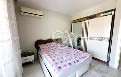 Emsallerinin Altında Kuşadası Lila Evler'de Satılık 2+1 Daire