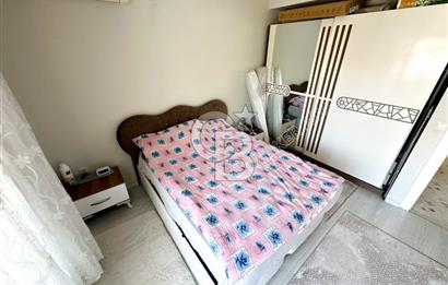 Emsallerinin Altında Kuşadası Lila Evler'de Satılık 2+1 Daire