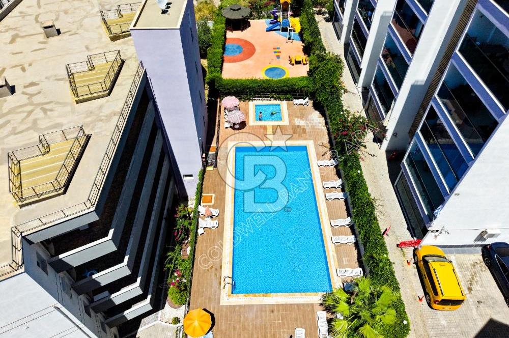 Emsallerinin Altında Kuşadası Lila Evler'de Satılık 2+1 Daire