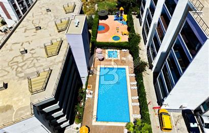 Emsallerinin Altında Kuşadası Lila Evler'de Satılık 2+1 Daire