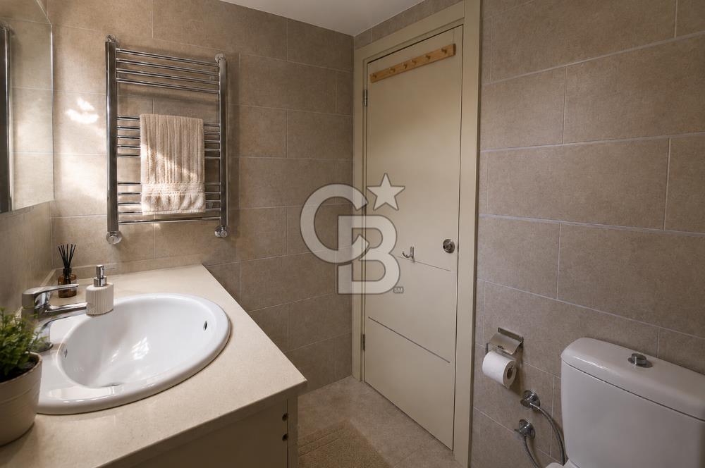 Emlak Konut Mavişehir’de Havuz Cepheli 1+1 Satılık Daire