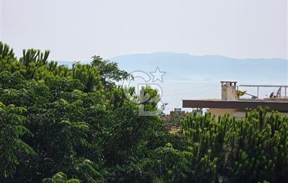 Kuşadası Camiatik'te Deniz Manzaralı 3+1 Çatı Dubleks